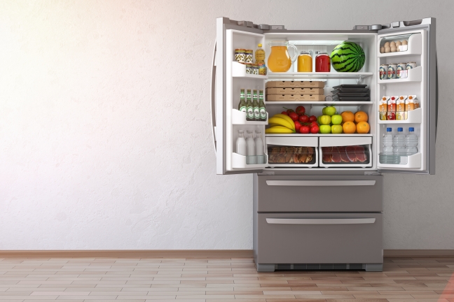 Freestanding fridge freezer in a modern kitchen supplied by NEA Appliances in Bristol