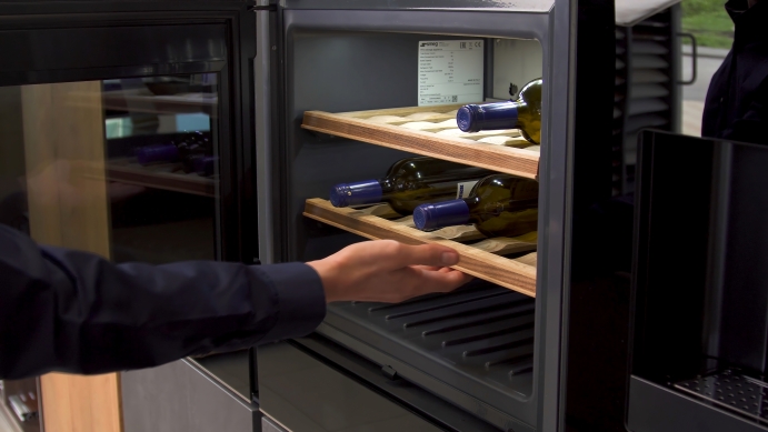 Wine cooler fridge with glass door and organised bottle storage