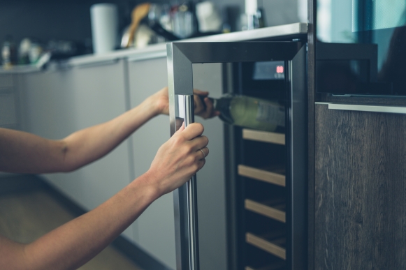 Built-in wine cooler in a modern kitchen with dedicated bottle storage