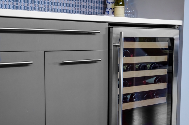 Elegant integrated wine cooler with glass door in a contemporary kitchen