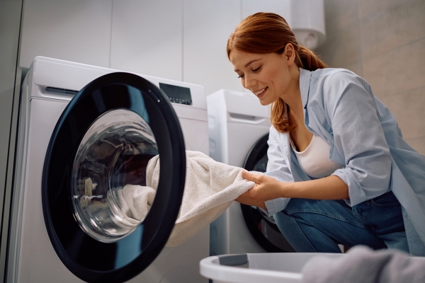 Freestanding washing machine in a stylish contemporary utility room