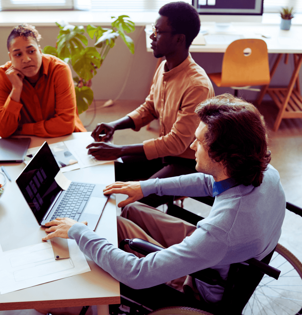 A meeting with a person using a wheelchair