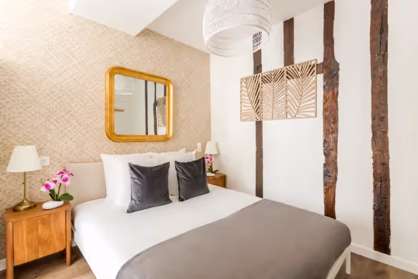 Le lit du Cozy Apartment Fbg Saint Antoine