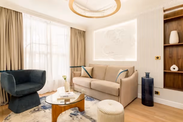 Le salon avec canapé Luxury Suite Lenoir I