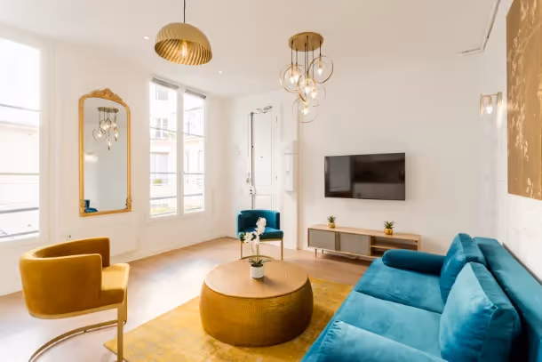 Le salon avec canapé Cozy Apartment Sainte Anne