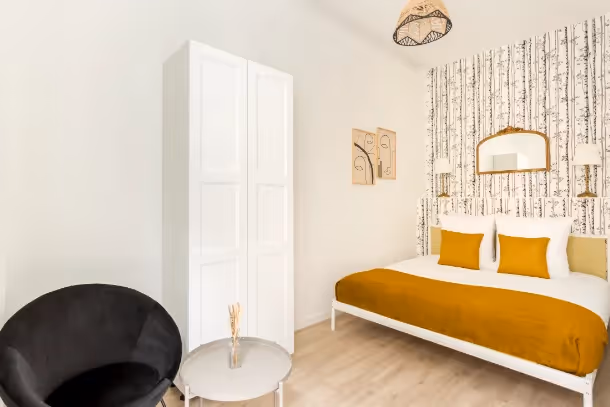 La chambre du Cozy Apartment Turin