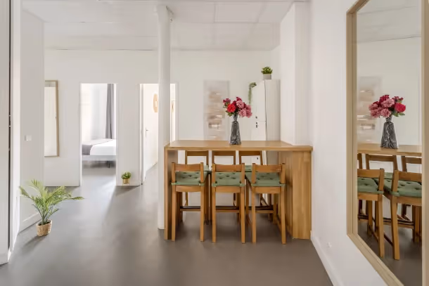 La salle à manger jaune Cozy Apartment Turbigo I