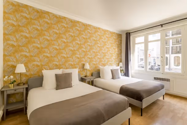 La chambre avec deux lits Cozy Apartment Mollien