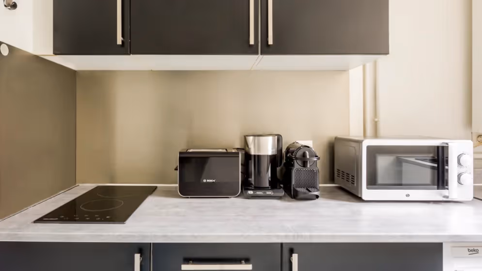 Le Cuisine Appartement cosy grande armee
