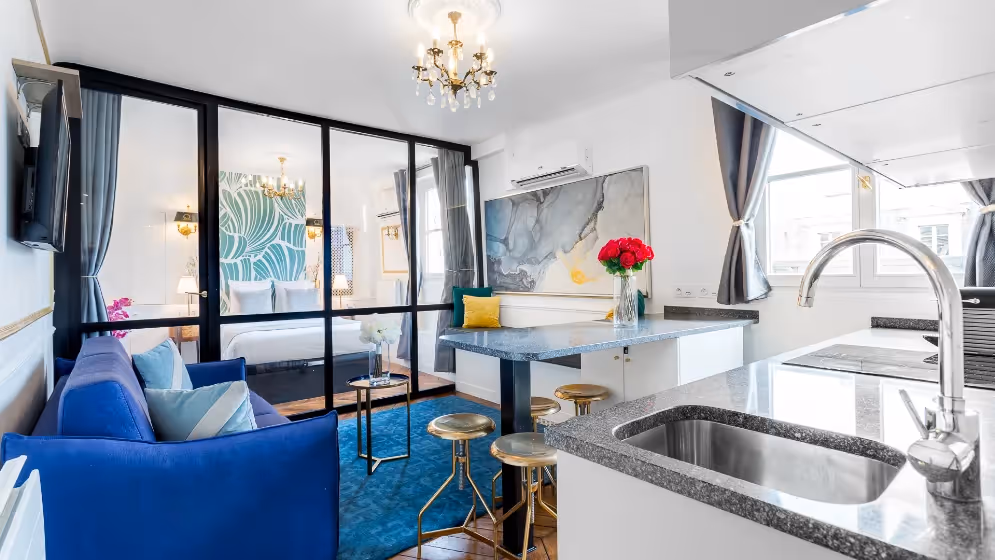 Le salon chambre et cuisine suite de luxe royale I vue madeleine