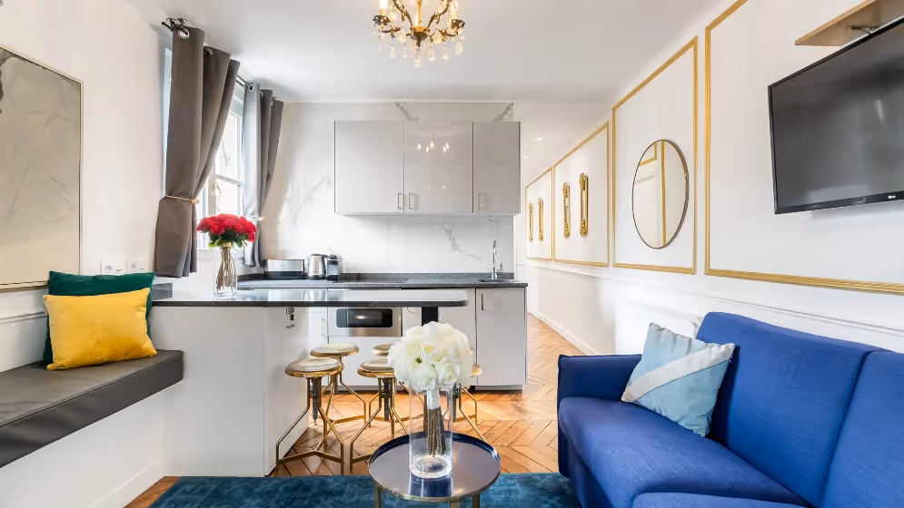 Le salon et cuisine suite de luxe royale I vue madeleine