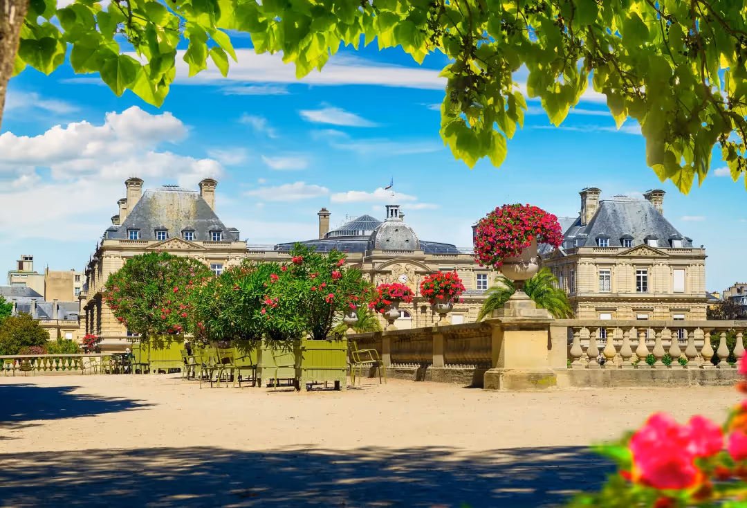 Sunny park full of flowers in the heart of Paris