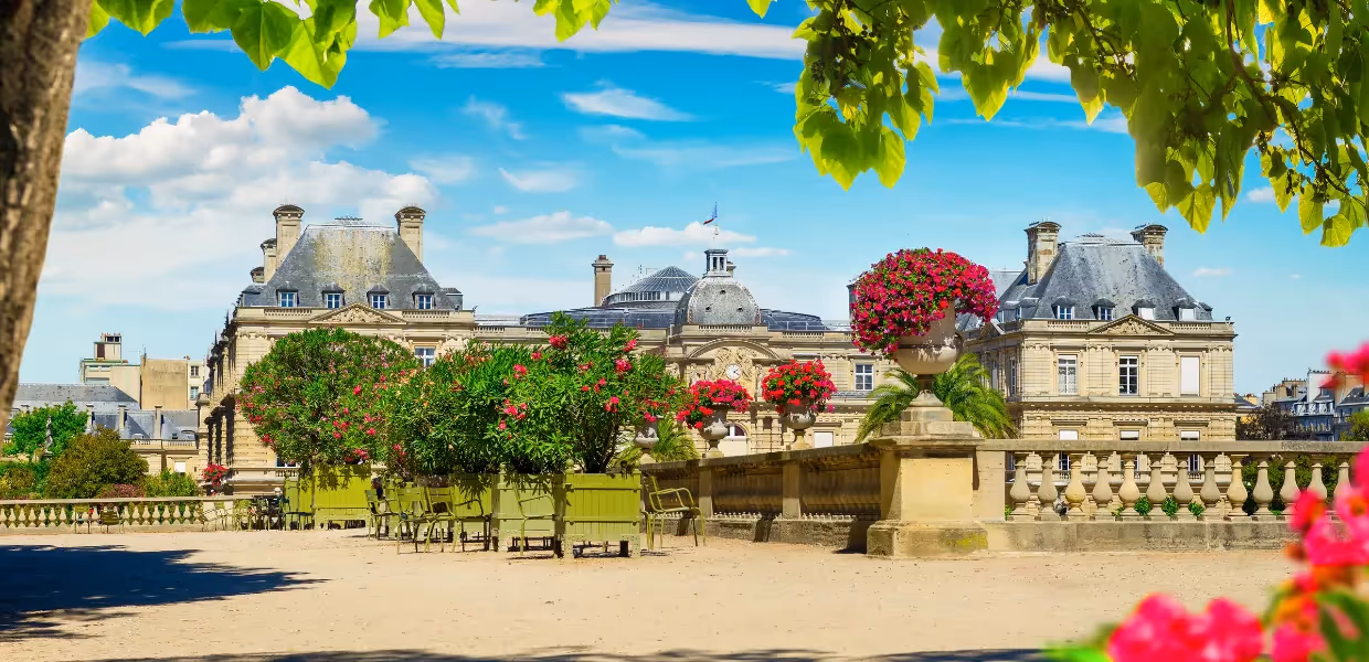 Sunny park full of flowers in the heart of Paris