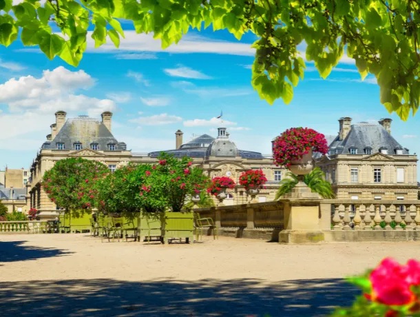 Sunny park full of flowers in the heart of Paris