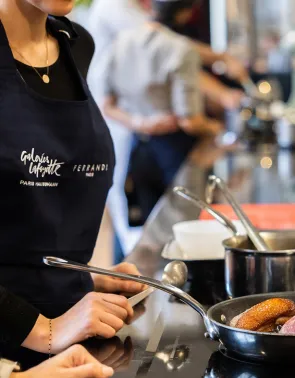 Image of a chef cutting food
