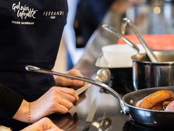 Image of a chef cutting food