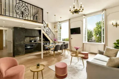 The living room with kitchen view Luxury Suite Florentin I