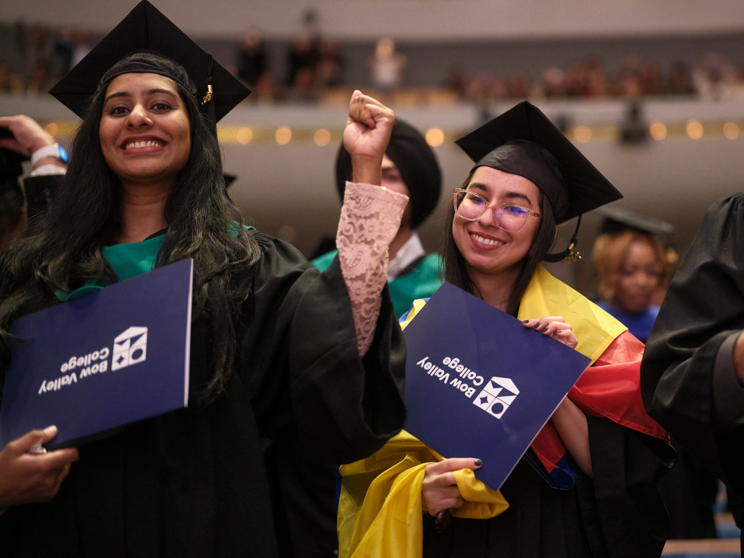 Bow Valley College graduates smile on at  Werklund Centre