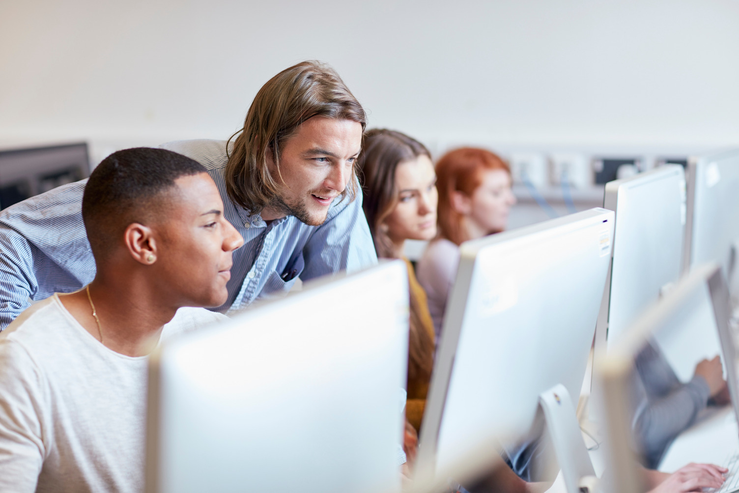 Students working in a computer lab.