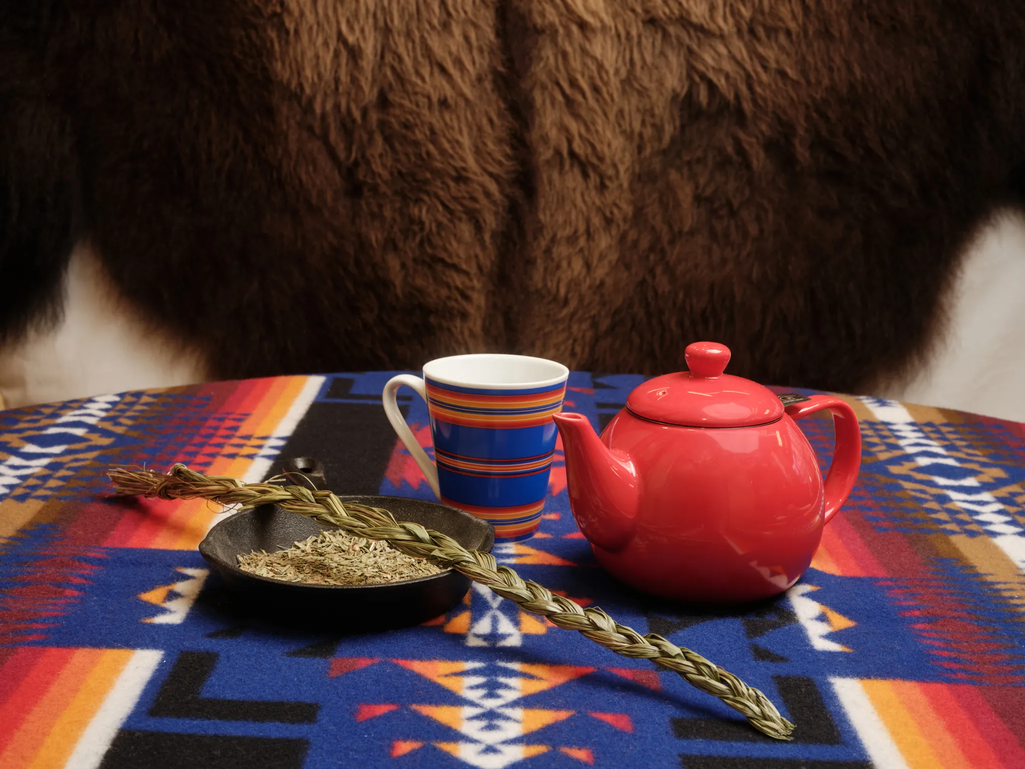 Cultural items: teapot, cup, sage from the Iniikokaan Centre