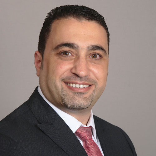 Dr. Khaled Taha, board-certified orthodontist at Ideal Dental Houston