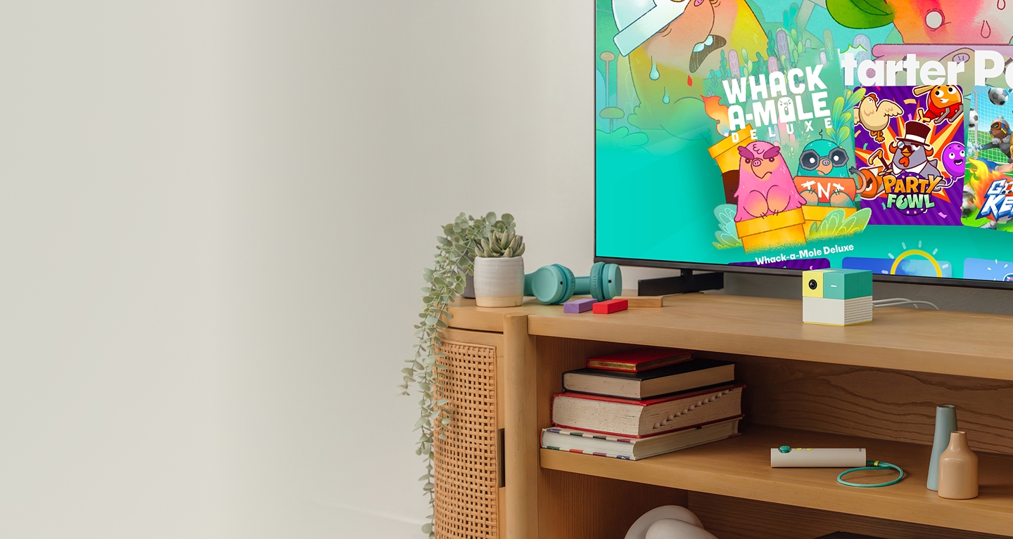 Media Console with a Playground and TV showing a game menu screen