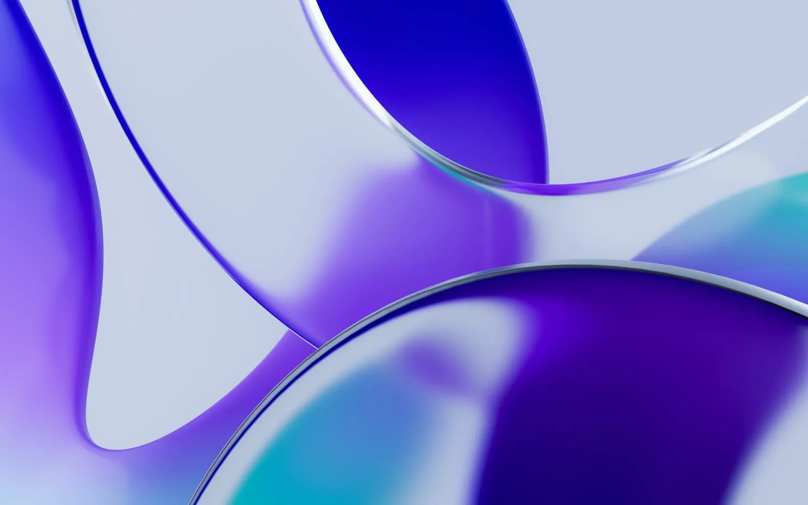 Close-up of interlocking translucent rings with gradients of blue and purple hues.