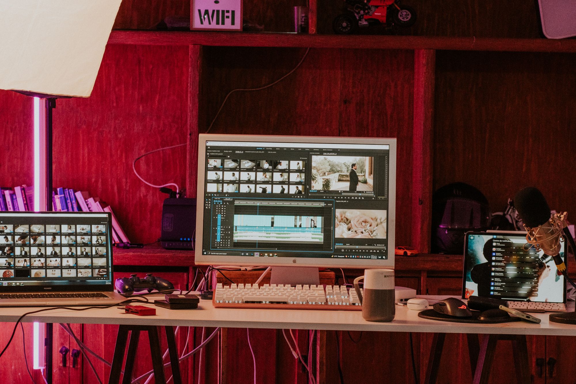 A home video editing suite with a timeline open on the monitor