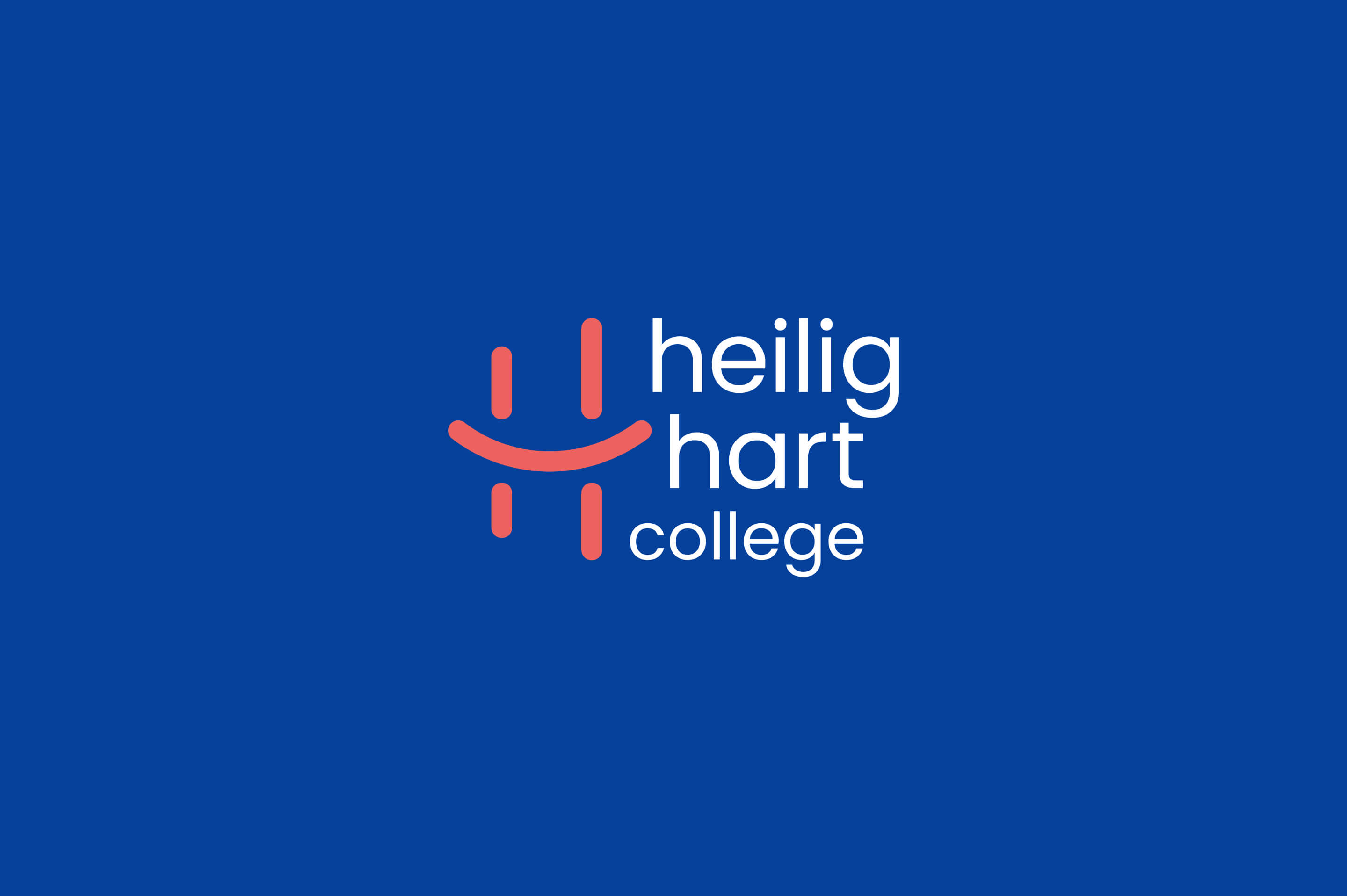 Het logo van Heilig Hart in een omslag gegoten.