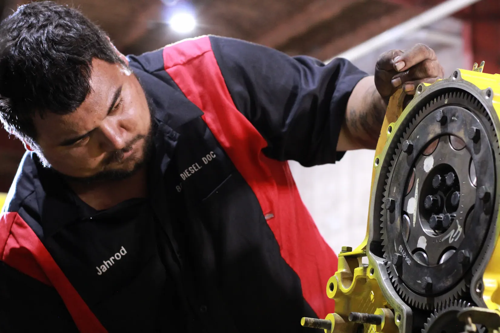 Diesel mechanic performing preventive maintenance services in Honolulu, HI