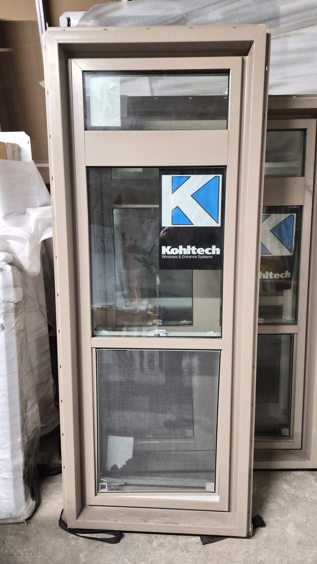 Kohltech 24 x 66 inch single hung window with transom, sandstone exterior