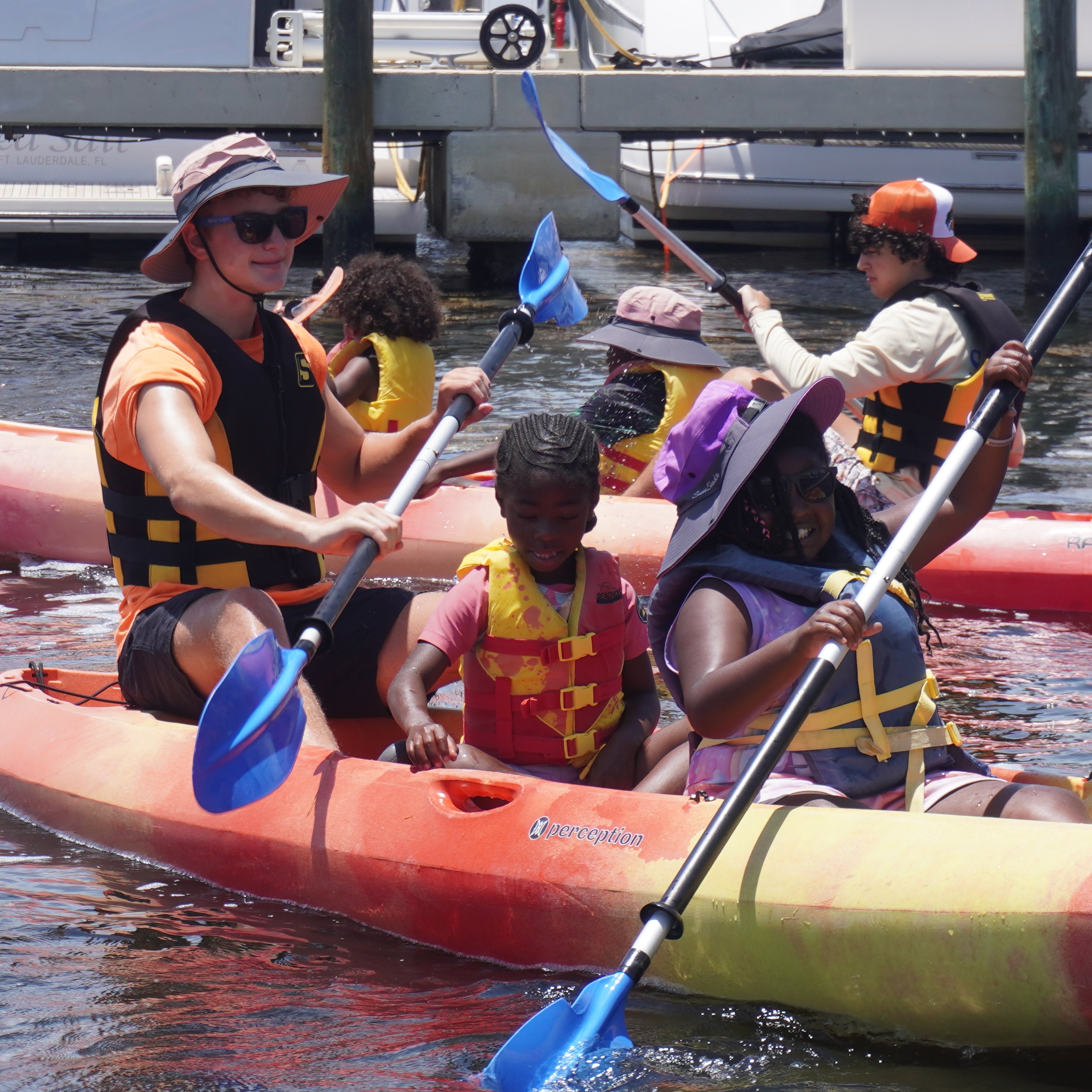 Participants kayaking together on Biscayne Bay