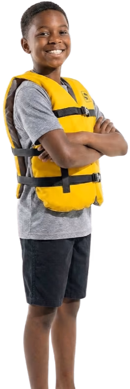 A young participant wearing a yellow life vest