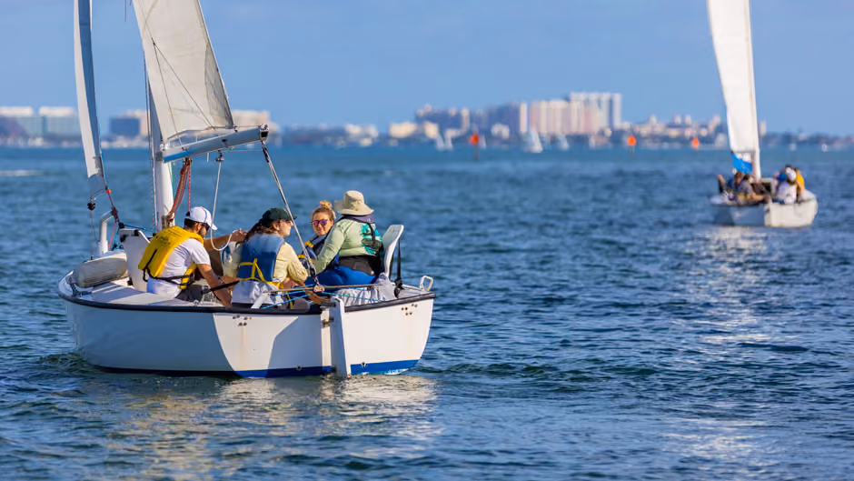 A Shake-A-Leg Miami keelboat under sail on Biscayne Bay