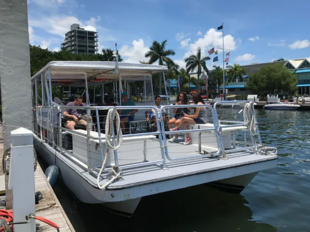 Sailors aboard the Pearson, our accessible 40-ft pontoon, at the dock