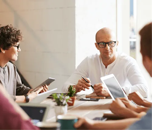 People sitting and talking at a business meeting