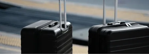 Two luggages at an airport