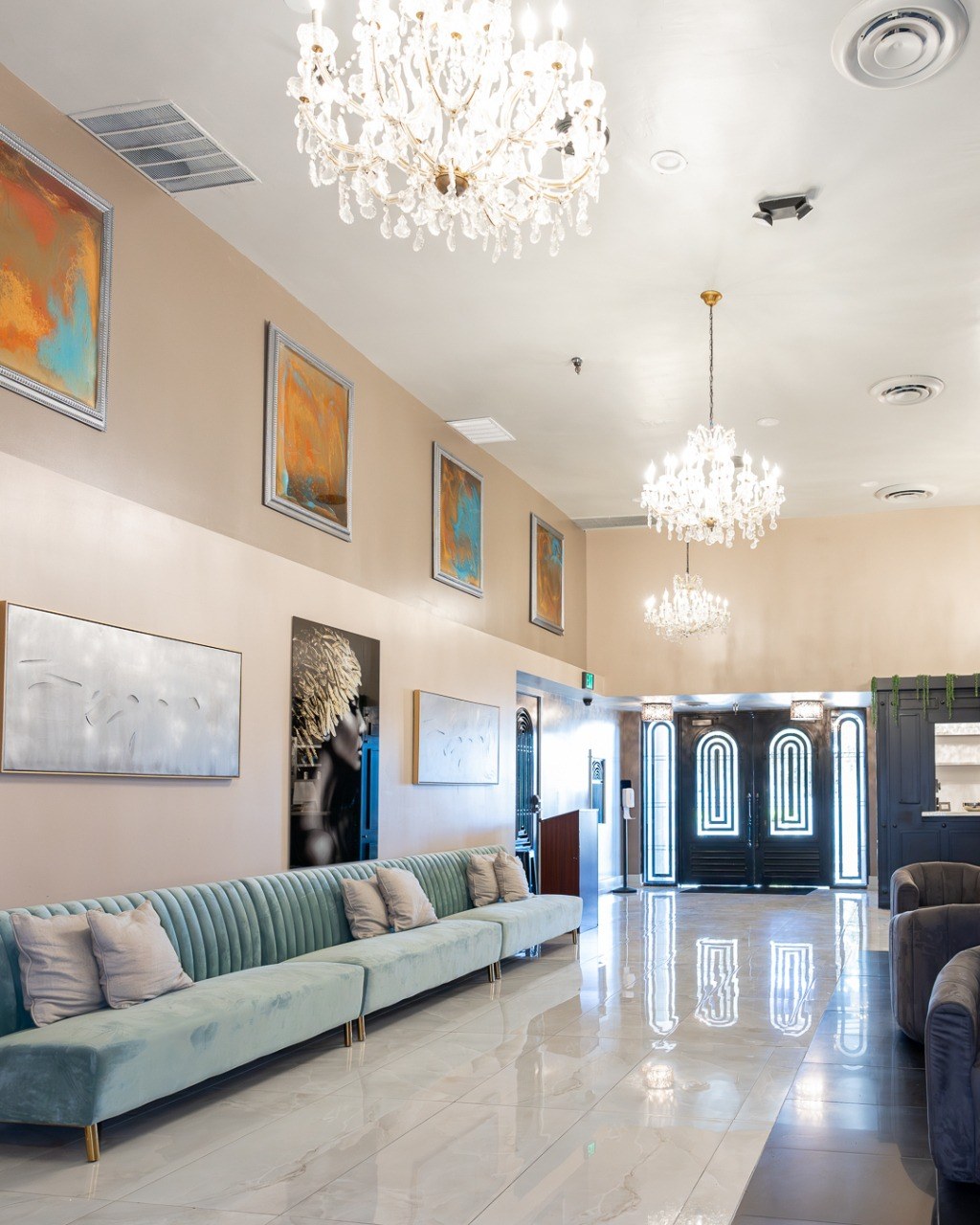 Chandeliers and velvet seating in the lobby