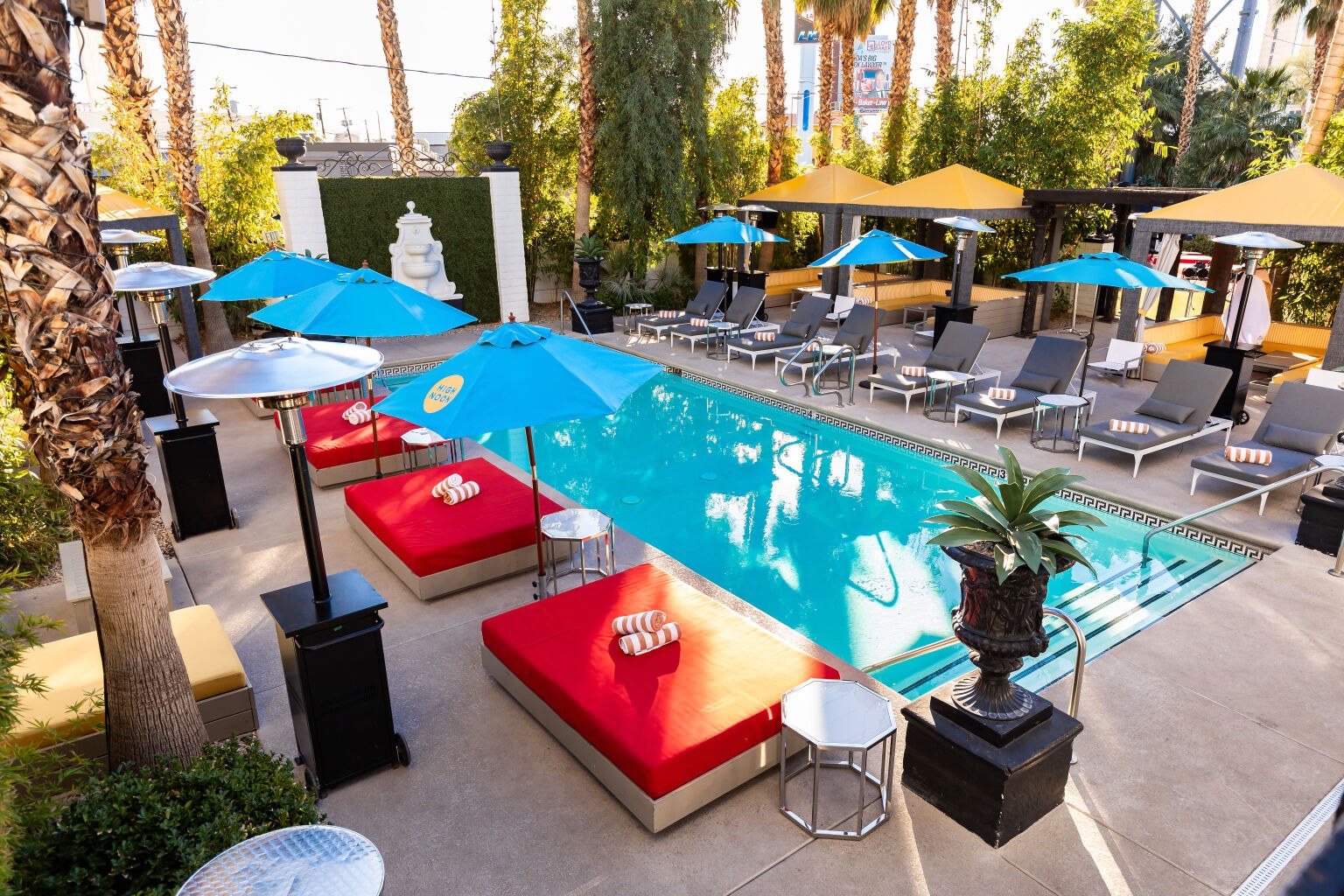 Poolside daybeds and umbrellas
