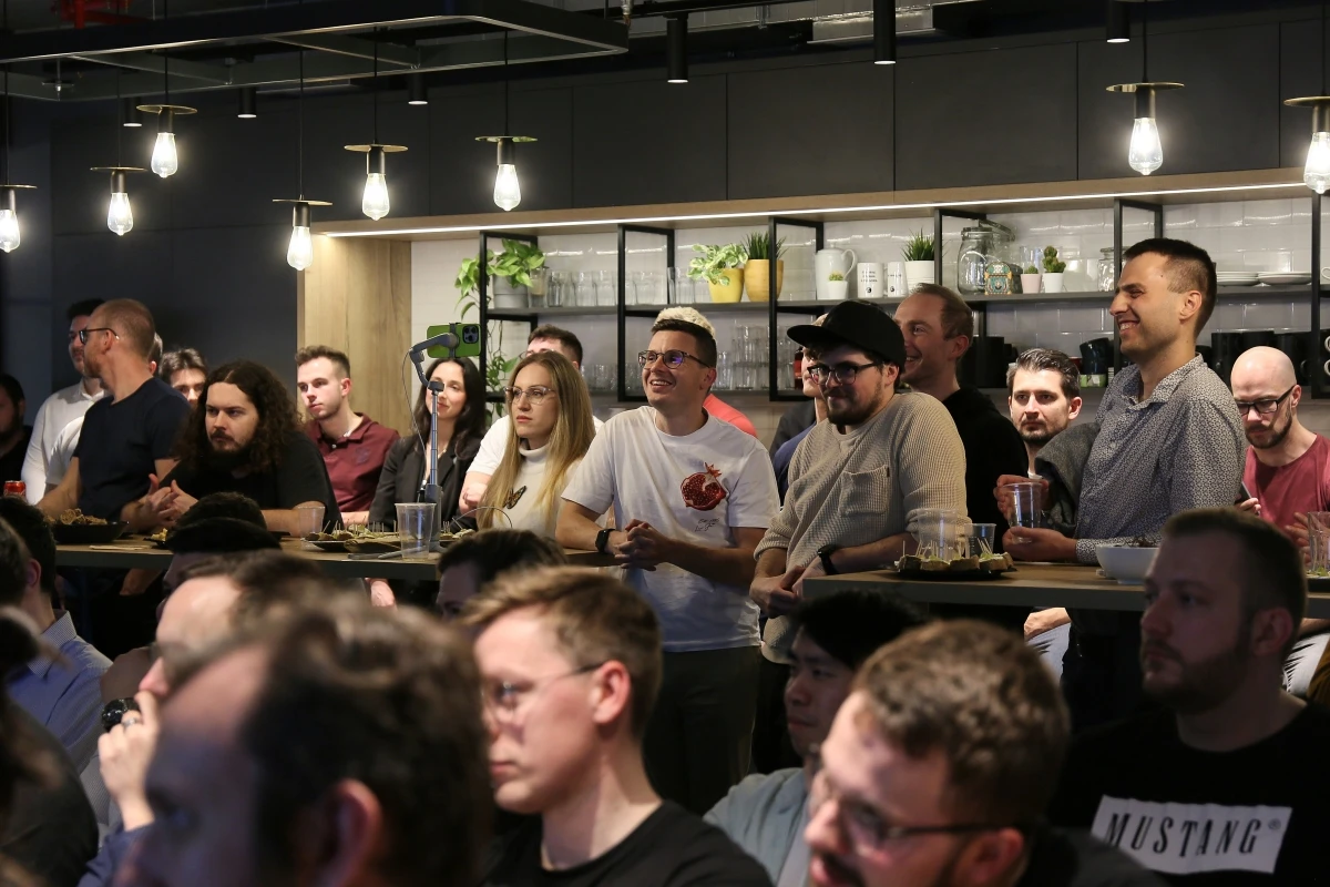 Cleevio team watches presentation about AI