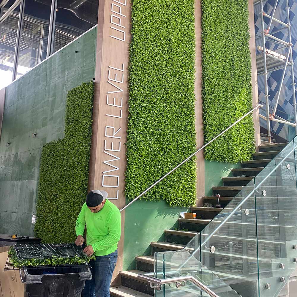 Large vertical accent strips of artificial plant walls