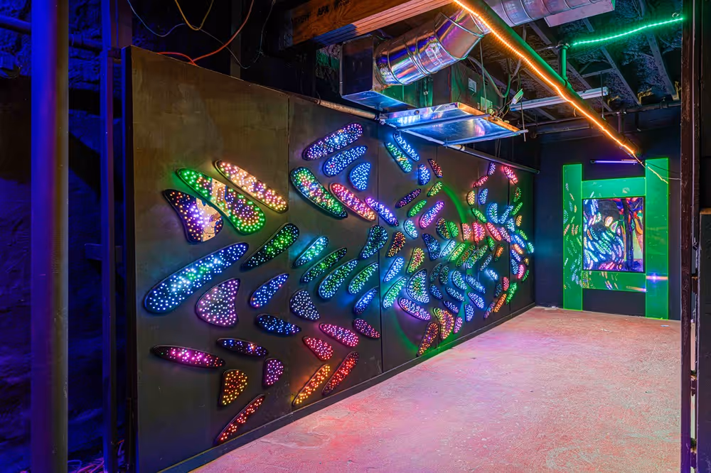 Colorful LED light art installation inside The Supermarket Atlanta, showcasing a vibrant and immersive display that highlights the venue's innovative use of technology and creativity in its event space.