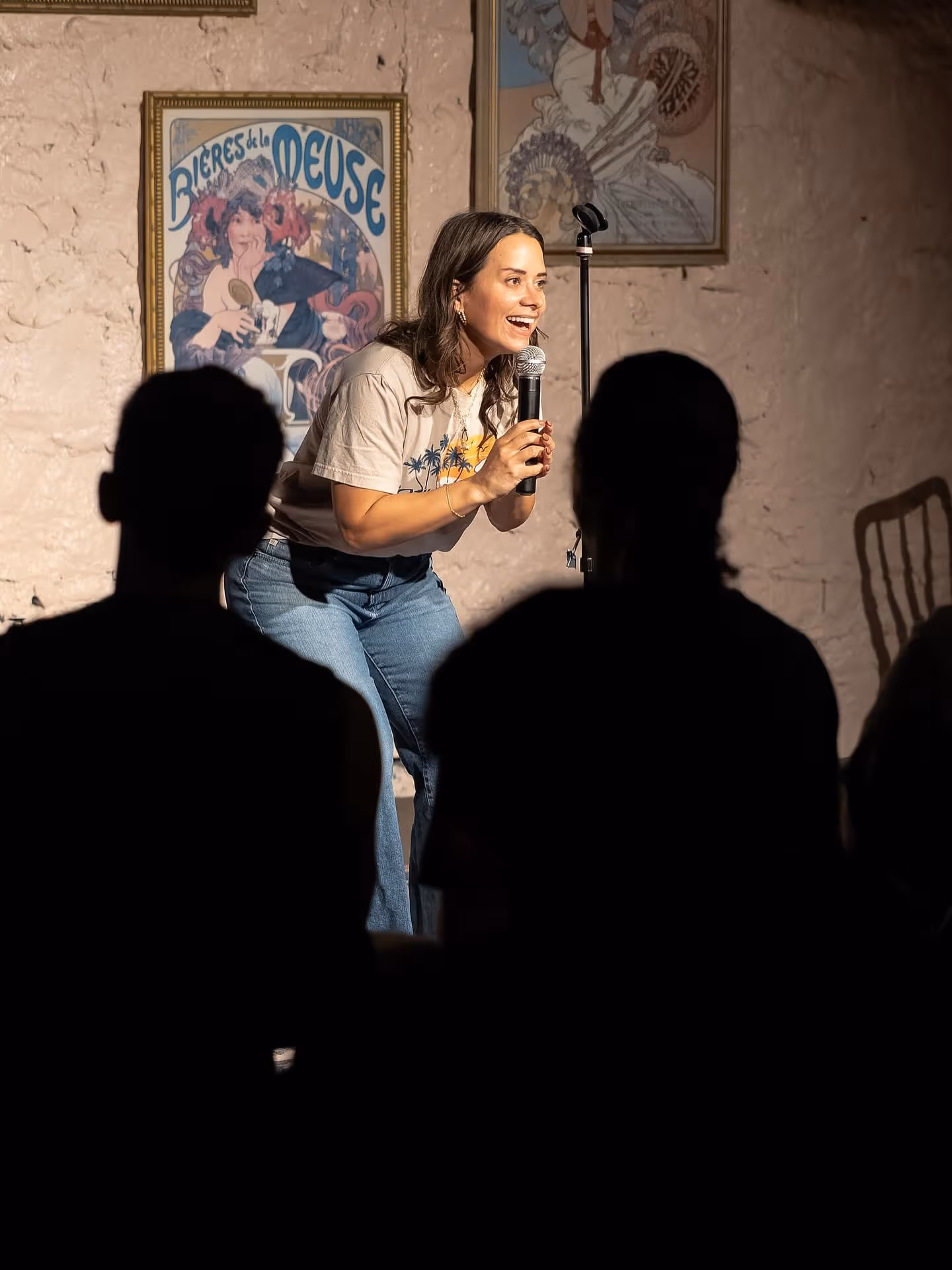 Comedian Lisandra Vázquez performing stand-up at Fresh Produce Comedy.