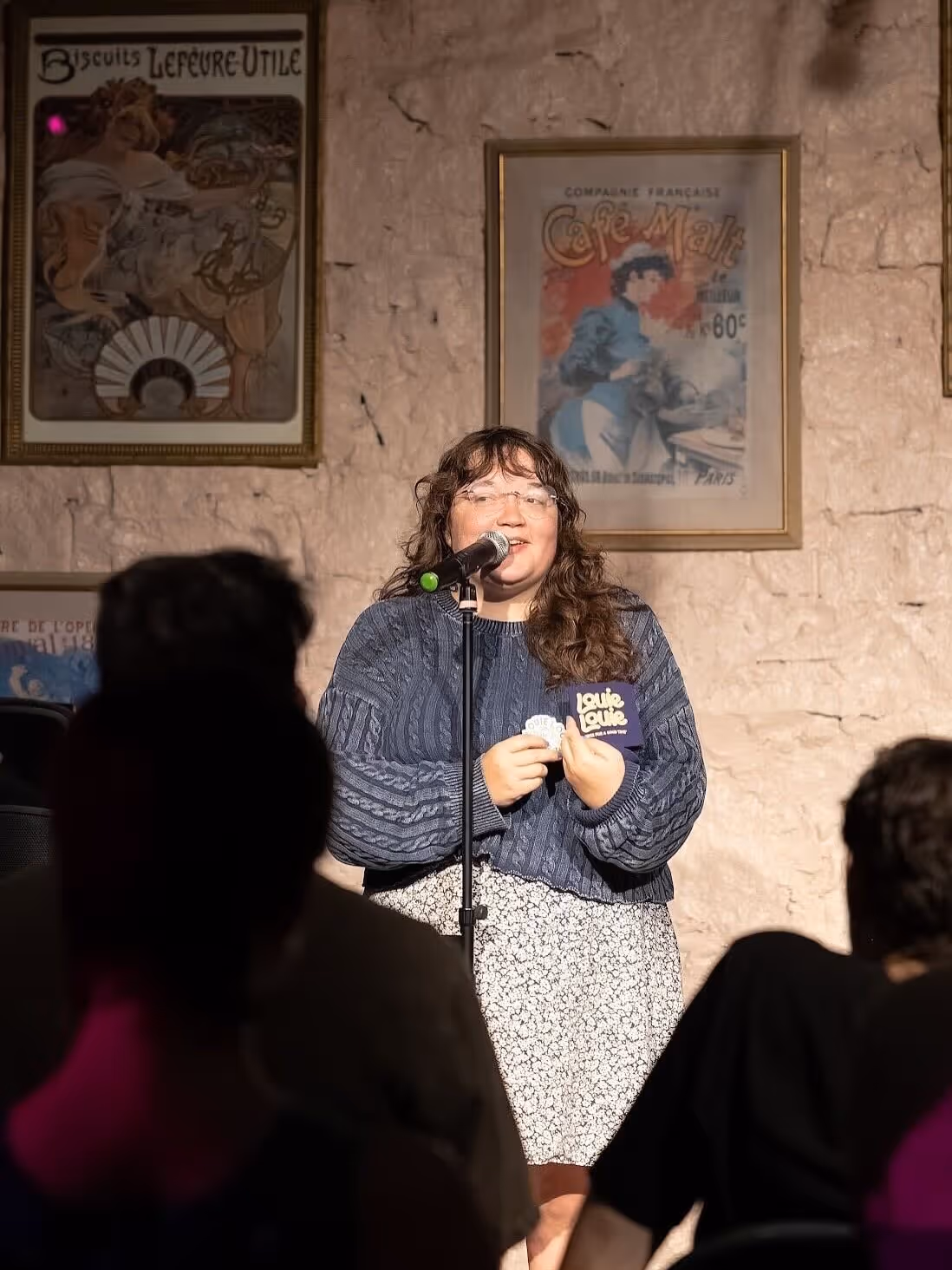 Comedian Marietta Mendler performing stand-up at Fresh Produce Comedy.