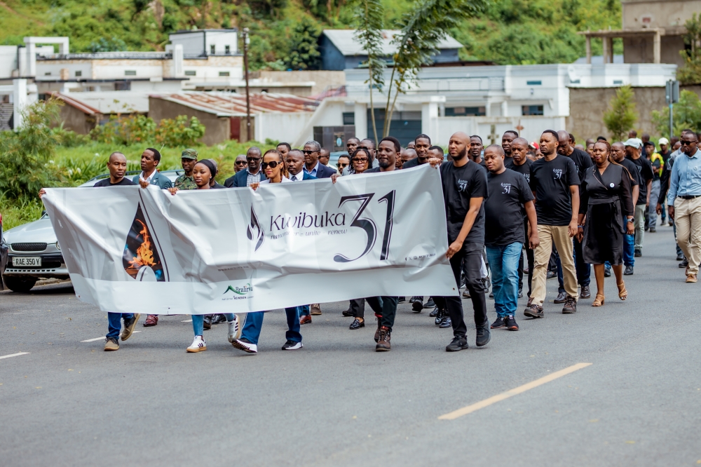 Bralirwa staff and management during a walk to remember during a commemoration event to pay tribute to former employees who were killed during the Genocide against the Tutsi at Gisenyi Genocide Memorial. Courtesy