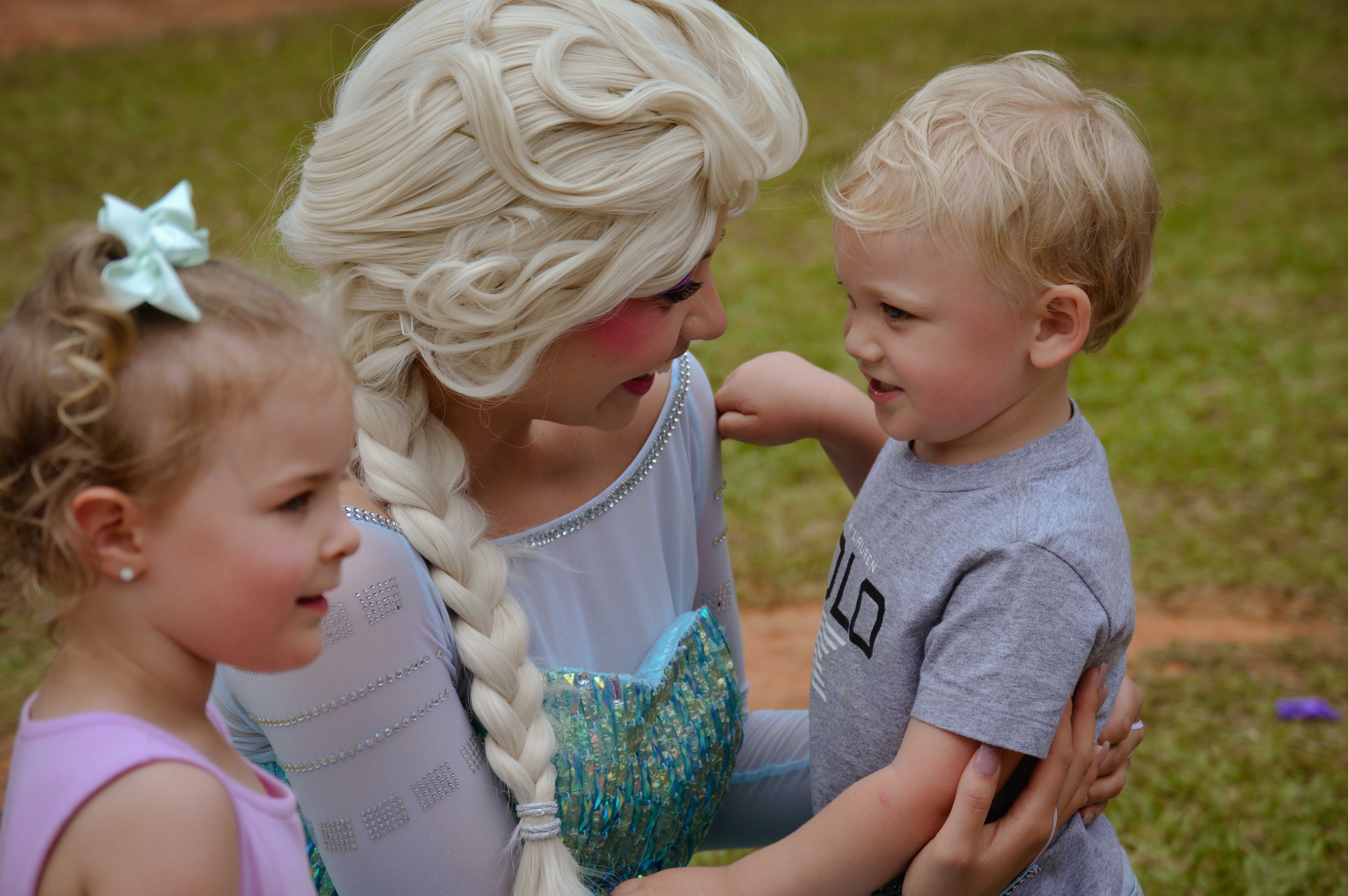 Elsa for hire in Atlanta hugging child