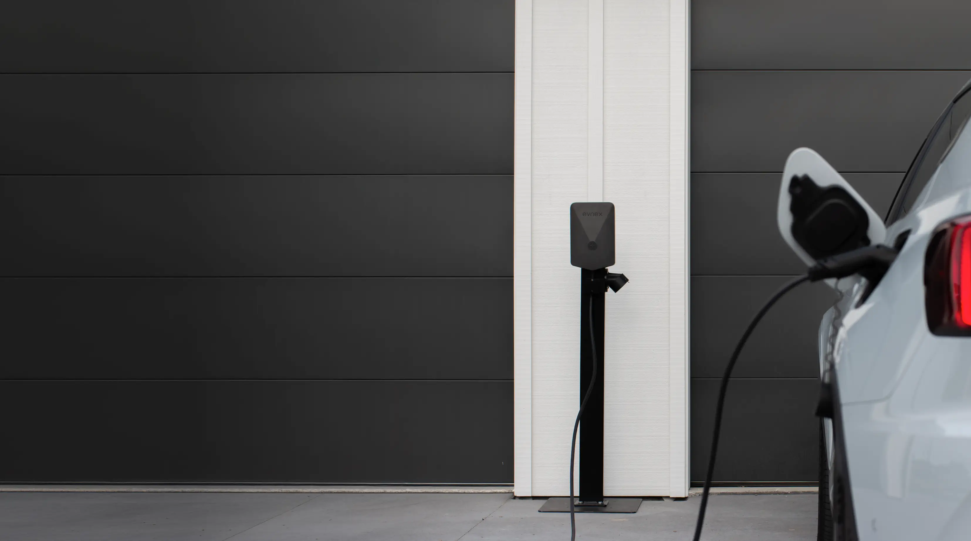A Polestar charging using an Evnex EV charger