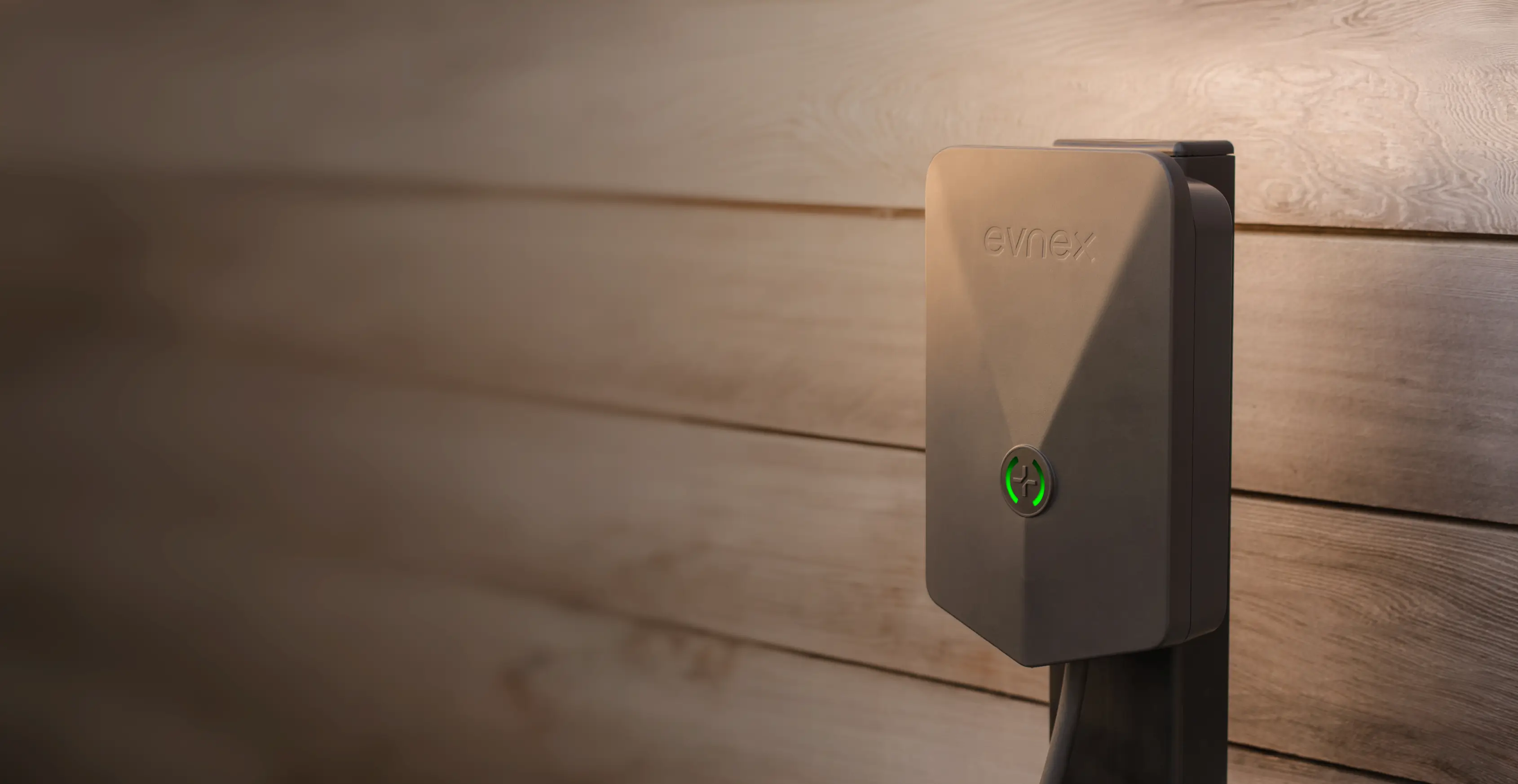 An electrified Skoda Elroq chargers using an Evnex EV charger