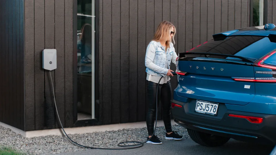 Women charging EV with Evnex E2 charger