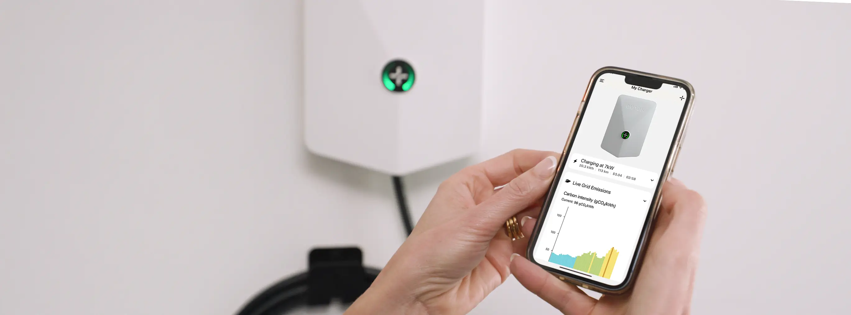 Person using Evnex driver app to schedule EV charging
